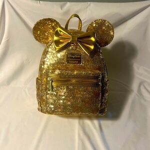Loungefly Disney Gold Sequin Backpack.